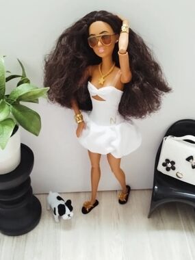 Fashion Doll in White Cutout Dress with Gold Accessories